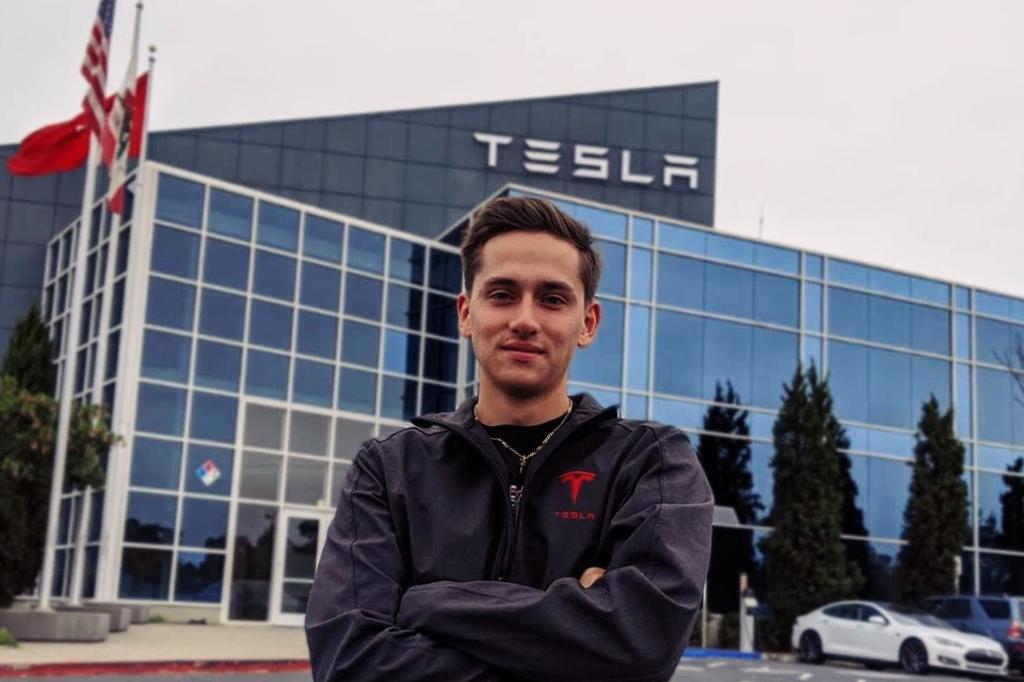 Daniel Scott Mitchell in front of Tesla headquarters in California.