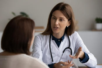 A doctor talks to a patient